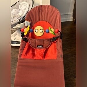 Red BabyBjorn bouncer with new toybar